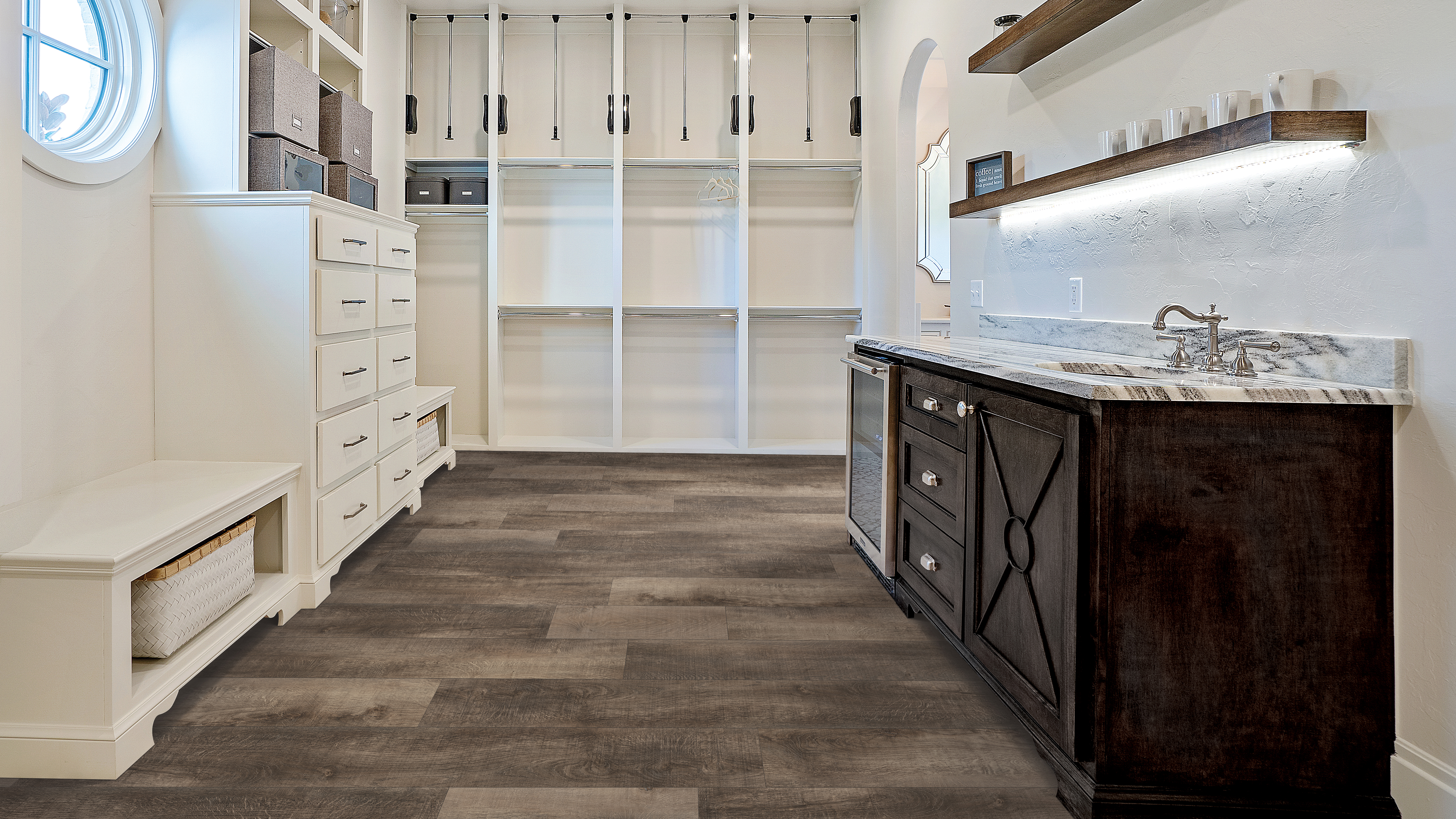 Luxury vinyl flooring in a laundry room, installation services available.