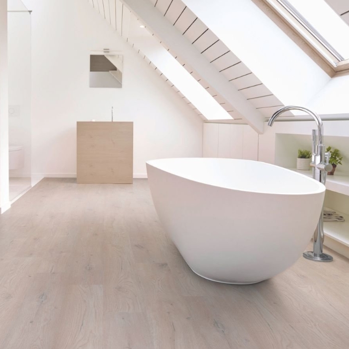 luxury vinyl flooring, white tub, white walls