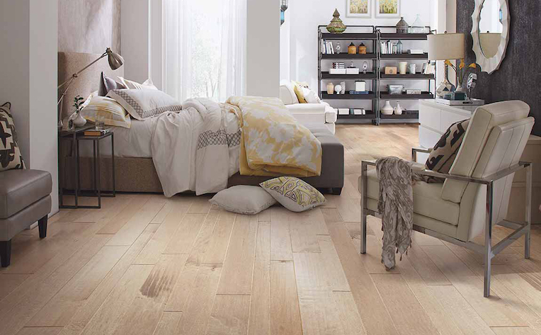 clean hardwood flooring in a bright bedroom