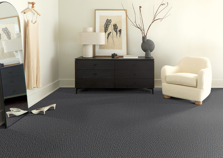 dark blue patterned carpet in bedroom